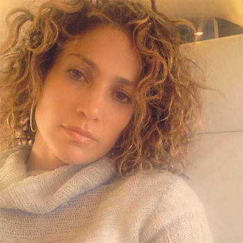 Jennifer Lopez gives a rare glimpse of her natural curls which she often wears straightened