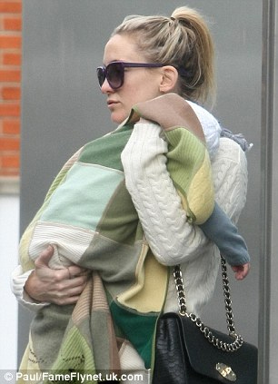 Kate Hudson with her baby  The Belgravia Centre