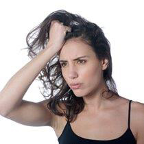 Troubled Woman Holding Hair White Background Small (2)