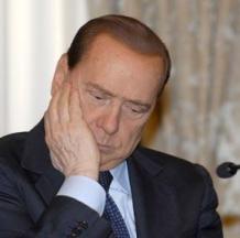 Silvio Berlusconi's controversial hairline appears intact